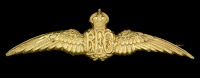 Royal Flying Corps Pilot’s Metal Brevet.
A very good original and scarce example of an early fire gilt metal...