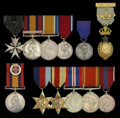 The unique Defence of Mafeking family group to Lieutenant-Colonel J. R. More, commanding the Railway Section at...
