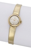 PH. Beguin. A lady’s gold bracelet watch, circa 1960.
Movement: manual winding, 17 jewels.
Dial: silvered,...