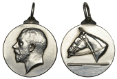 Uncertain, a silver medallet by Mappin and Webb, bust of George V left, rev. horse’s head left, Liver Bird(?) on...