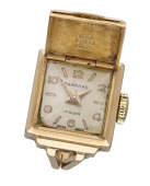 Garrard & Co. A gold ring watch, circa 1954.
Movement: manual winding, 17 jewels.
Dial: silvered, applied Arabic...