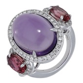 A gem-set dress ring by Jahel, set with an amethyst cabochon with an oval-cut pink tourmaline to either side, each...