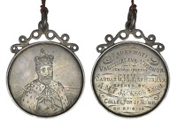 INDIA, 1909, an engraved silver presentation medal. unsigned, half-length portrait of Edward VII, crowned and robed,...