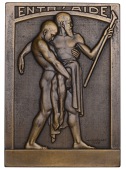 FRANCE, Entr’aide [Mutual Aid], 1933, an Art Déco uniface bronze plaque by R. Cochet, naked young man carrying a...