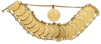 A gold coin bracelet, set throughout with 19 Ottoman Empire 50 Kurus gold coins, length 16cm. 	 £4,000-£5,000
