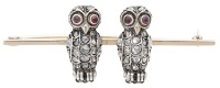 An antique diamond owl brooch, the gold bar applied with two owls, set throughout with rose-cut diamonds and with...