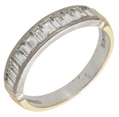 A diamond half eternity ring, channel-set to the front with a row of baguette-cut diamonds, mounted in 18ct gold, UK...
