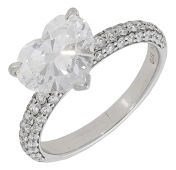 A diamond ring, set with a heart-shaped diamond, weighing 3.01 carats, the gallery and shoulders set with...