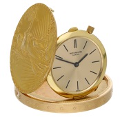 Patek Philippe. A rare gold Twenty Dollar Liberty coin watch, Ref. 802, circa 1974.
Movement: cal. 175, manual...