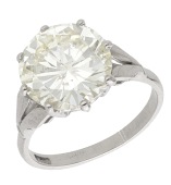 A diamond single stone ring, claw-set with a brilliant-cut diamond, weighing 5.33 carats, stamped ‘18CT’, ring...