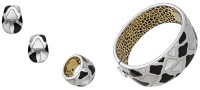 An onyx and mother-of-pearl suite by Roberto Coin, the tapered bangle inlaid with shaped onyx and mother-of-pearl...