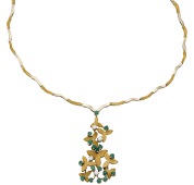 An emerald and diamond necklace, the bicolour links of undulating design and with alternating polished and textured...