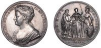 Queen Caroline, Coronation, 1727, a silver medal by J. Croker, bust left, rev. Queen standing between Religion and...