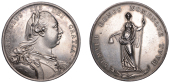 George III, c. 1775, a silver medal by L. Pingo, laureate and armoured bust right, rev. standing figure of Liberty,...