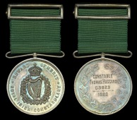 A 1920 Constabulary Medal (Ireland) awarded to Constable T. Huggard, Royal Irish Constabulary, for his gallantry in...