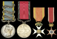A rare Carlist War and Crimea Light Brigade group of four awarded to Major J. Hely, Paymaster, 11th Hussars, late...