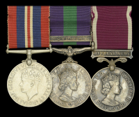 Three: Staff Sergeant J. W. Howard, Royal Army Pay Corps

War Medal 1939-45; General Service 1918-62, 1 clasp,...