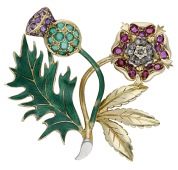 A gem-set brooch, designed as a Scottish thistle and Tudor rose, with green enamel detailing and circular-cut...