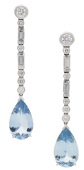 A pair of aquamarine and diamond ear pendants, each articulated row of brilliant and baguette-cut diamonds...