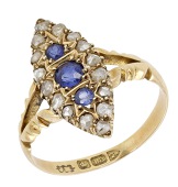 A sapphire and diamond cluster ring, circa 1900, of marquise form and set with circular-cut sapphires and rose-cut...