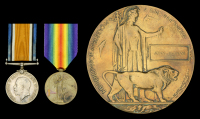 Pair: Private T. J. Badham, Middlesex Regiment, who died of wounds on the Western Front on 26 September...