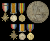 Family Group:

Three: Private J. W. Mills, Middlesex Regiment, who was killed in action on the first day of the...