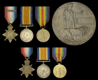 Family Group:

Three: Private J. W. Mills, Middlesex Regiment, who was killed in action on the first day of the...