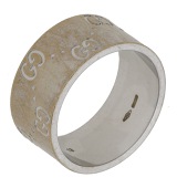 An ‘Icon’ ring by Gucci, with Double G and dot pattern, signed, stamped ‘750’, Italian assay mark, numbered...