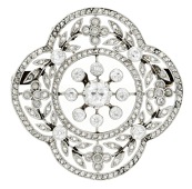 A quatrefoil diamond brooch/pendant, circa 1910, the central open cluster of old-cut diamonds, encircled by rose and...