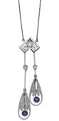 An early 20th century sapphire and diamond negligée pendant, the central Greek key motif with diamond highlight,...