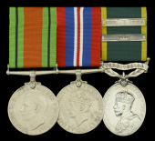 Three: Sergeant H. Druce, Devonshire Regiment

Defence and War Medals 1939-45; Efficiency Medal G.V.R., 1st issue,...