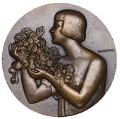 FRANCE, Femme aux fleurs [Woman with Flowers], 1931, an Art Déco uniface bronze medal by P.-C. Lenoir, half-length...