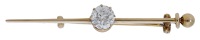 An early 20th century diamond bar brooch, claw-set with an old brilliant-cut diamond, with bead terminal, mounted in...