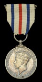 King’s Medal for Service in the Cause of Freedom, unnamed as issued, on original investiture pin in Royal Mint...