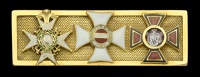 A fine quality ‘triple Order’ gold Riband bar depicting the miniature badges of the Orders of the Bath, Maria...