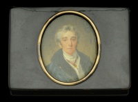 The Duke of Wellington, oval portrait miniature in oils of the Duke in a heavy blue coat with black collar wearing...