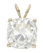 A diamond pendant, the old cushion-cut diamond, weighing 4.98 carats, claw set beneath a bifurcated bale, length...