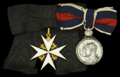 An unattributed Order of St. John pair

The Order of St. John of Jerusalem, Dame of Justice shoulder badge, gold...