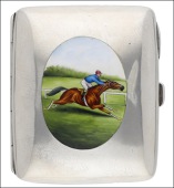 An Edwardian silver bowed rectangular cigarette case, the front enamelled with oval horse racing scene, the jockey...