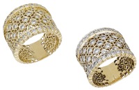 Two diamond dress rings, both of pierced latticework design, set with brilliant-cut diamonds, one with UK hallmark...
