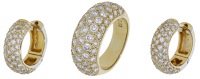 A diamond ring and earrings, the bombé ring pavé-set to the front with brilliant-cut diamonds, the ear hoops of...