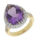 An amethyst and diamond ring, the pear-shaped amethyst within a surround of brilliant-cut diamonds, the swagged...