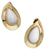 A pair of opal ear clips, the pear-shaped opal cabochons in similarly-shaped mounts, length 25mm. 	 £400-£600