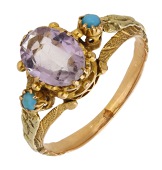 An amethyst and turquoise ring, circa 1840, the oval mixed-cut amethyst in raised scalloped claw setting, between...