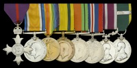 An inter-War M.B.E. group of eight awarded to Regimental Quartermaster Sergeant G. C. Grimes, Devonshire Regiment,...