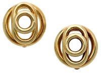 A pair of ear clips, of bombé design, formed of stacked openwork hoops, Italian assay mark, stamped ‘750’,...