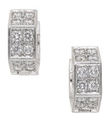 A pair of diamond earrings by Bucherer, of hexagonal form, set to the front and sides with brilliant-cut diamonds,...