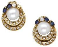 A pair of gem-set ear clips, each centred with a cultured pearl above two crescents set with brilliant-cut diamonds,...