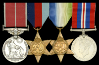 A fine Second War ‘Defensively Equipped Merchant Ships’ B.E.M. group of four awarded to Gunner V. G. Gurney,...