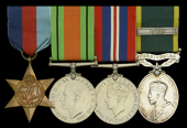 Four: Quartermaster Sergeant S. J. Ridler, Devonshire Regiment, who, having been evacuated following the fall of...